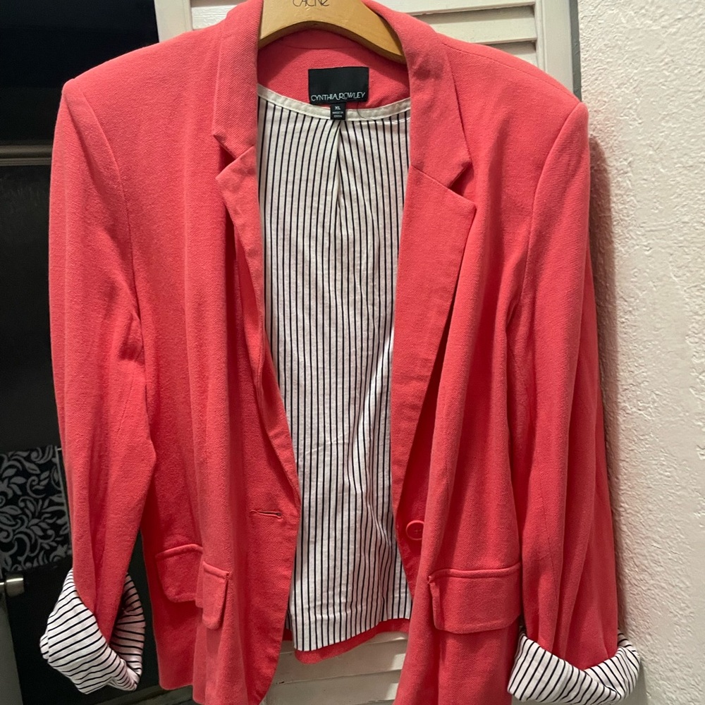 Pink and striped dress or casual jacket. See pictures for details.